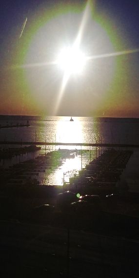 Sunrising over Lake Michigan horizon